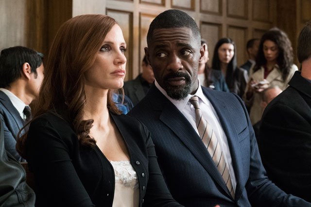 Idris Elba and Jessica Chastain in Molly's Game