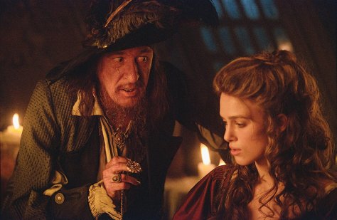 Geoffery Rush and Keira Knightley in Pirates of the Caribbean: The Curse of the Black Pearl